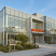 Wells Fargo Investment Center building with glass facade and landscaped surroundings